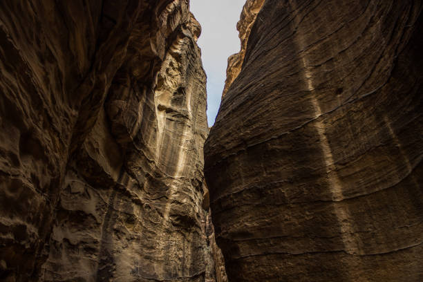 istock canyon road narrow path way for walking between steep rock walls 1198131630