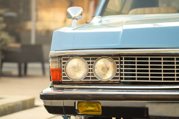 istock Part with headlight of an old blue car. 1198132262