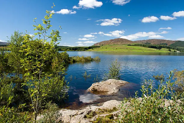 Clattingshaws loch with Galloway Hills in the background.