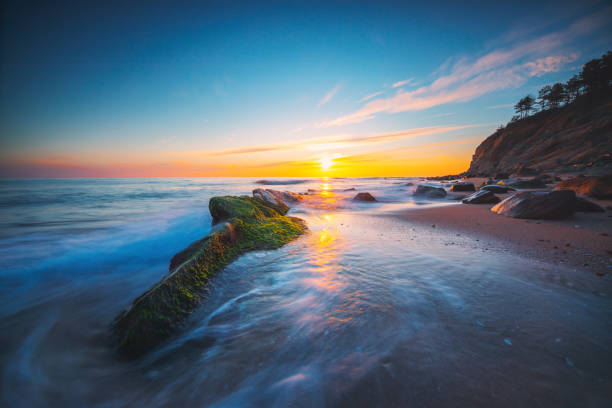 istock Beautiful cloudscape over the sea, sunrise shot 1198135733