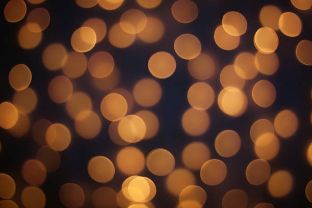 istock Abstract blur golden bokeh light Christmas holiday background 1198137019