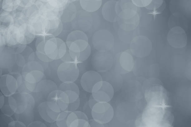 istock Silver bokeh abstract texture. Gray defocused background with bl 1198137181
