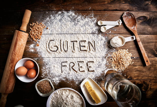 istock Gluten free bread ingredients and utensils on wood frame background 1198141103