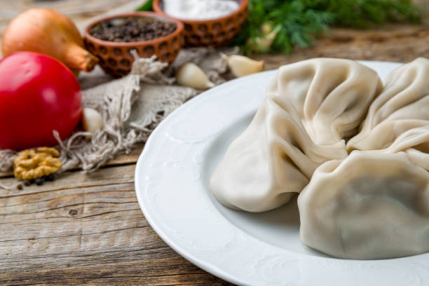 istock Khinkali with lamb on wooden table 1198141843