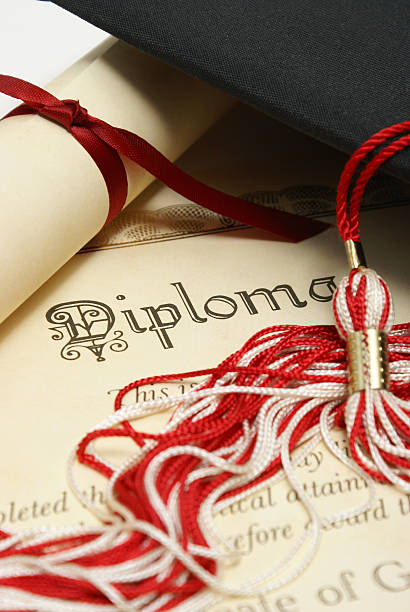 istock Diploma with graduation cap and tassel 119814344