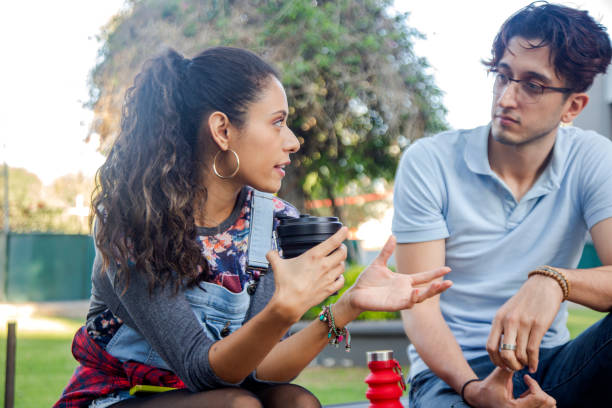 istock College students, chatting in the school 1198144334