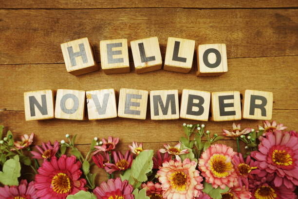istock Hello November alphabet letters on wooden background 1198162424
