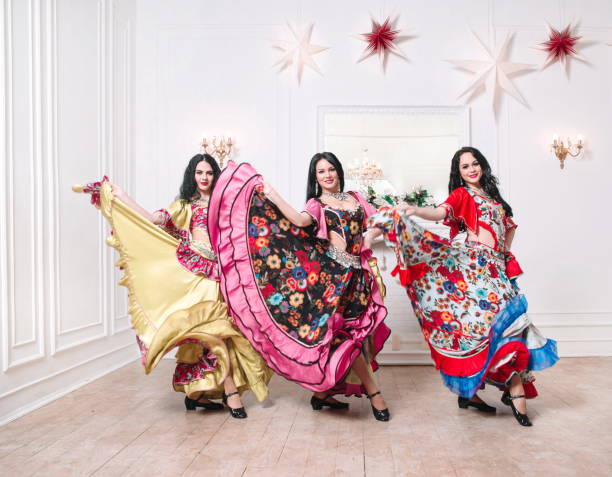 istock three attractive female dancers performing a Gypsy dance 1198165696