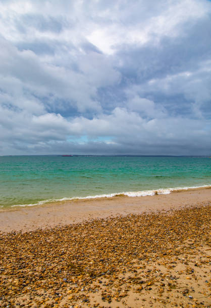 Aerial view of endless sea and cloudy sky.