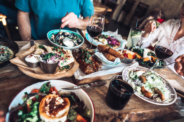 istock Enjoying lunch with friends 1198179249