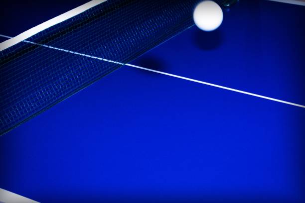 istock background with ball for table tennis over a table in blue with white lines 1198182595
