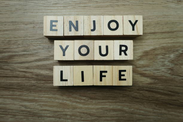 istock Enjoy Your Life alphabet letter cubes 1198182913