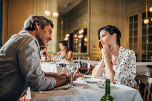 istock Couple on a date in restaurant 1198197007