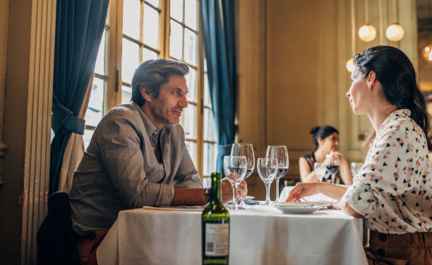 istock Couple on a date in restaurant 1198197059