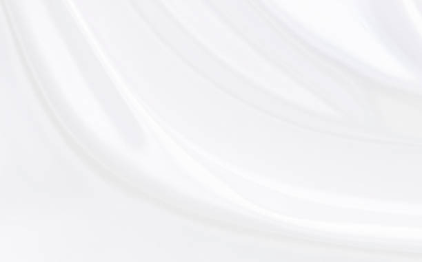 istock White gray satin texture that is white silver fabric silk background with beautiful soft blur pattern natural. 1198200021