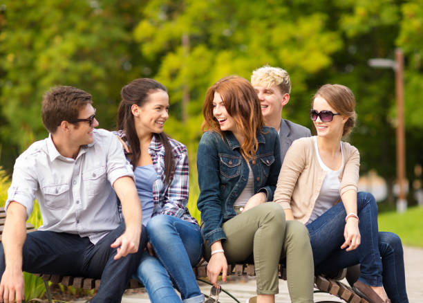 istock group of students or teenagers hanging out 1198201084