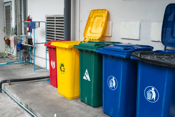istock Garbage Trash Bins for collecting a recycle materials. Garbage trash bins for waste segregation. Separate waste collection food waste, plastic, paper and danger waste. Recycling. Environment. 1198202084