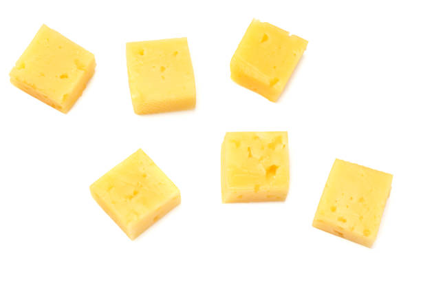 istock cheese slices isolated on white background. top view 1198202694