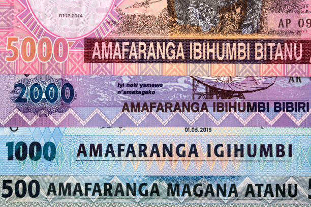 Rwandan money - franc a background Rwandan money - franc a business background french currency stock pictures, royalty-free photos & images