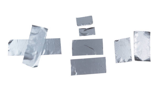 istock Silver scotch tape pieces isolated on white background. 1198205489