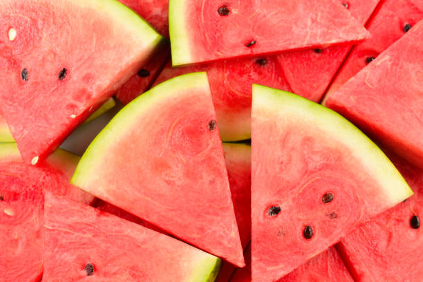 istock Juicy watermelon slices background. Top view. 1198205532