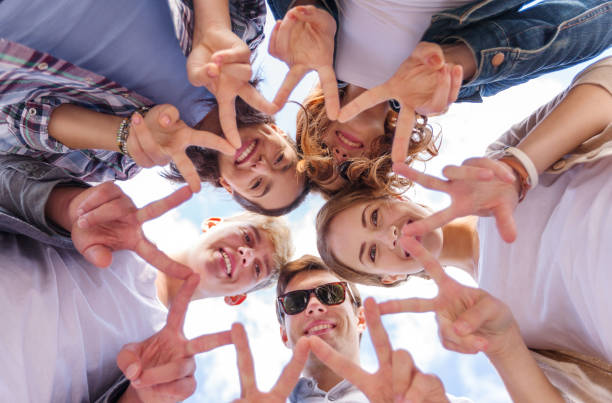 istock group of teenagers showing finger five 1198206257