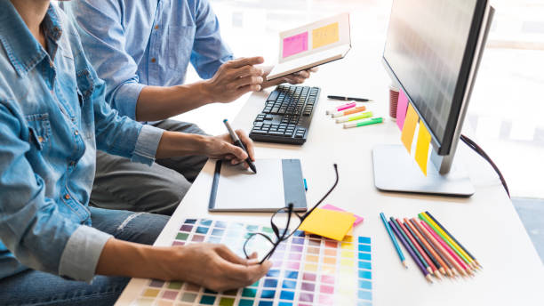 istock Midsection Of Businessmen Working On Table In Office 1198206864