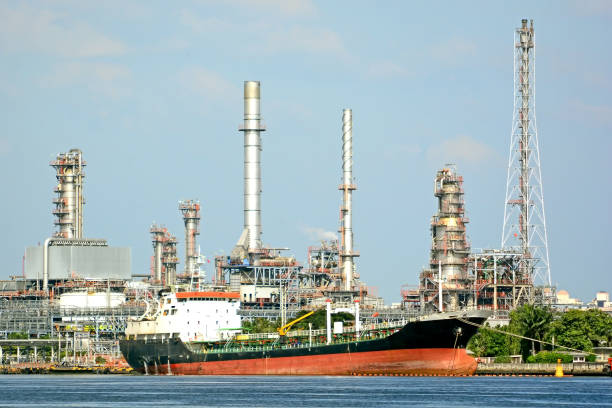 istock Seafront industry and Cargo ship and Seaside factory 1198206974