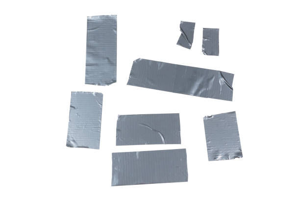 istock Silver scotch tape pieces isolated on white background. 1198207693