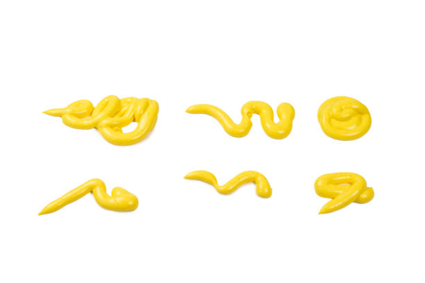 istock Yellow cheese sauce splashes isolated on white background 1198207715