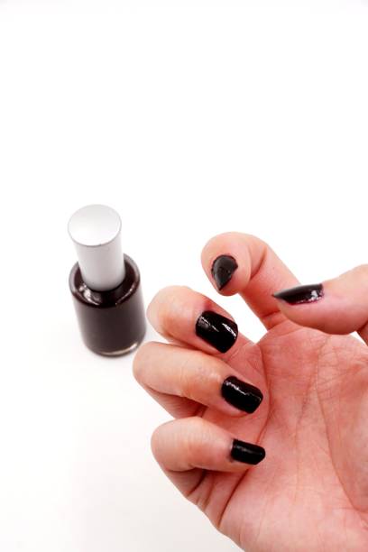 istock Dark red nail polish for a bold look 1198211636