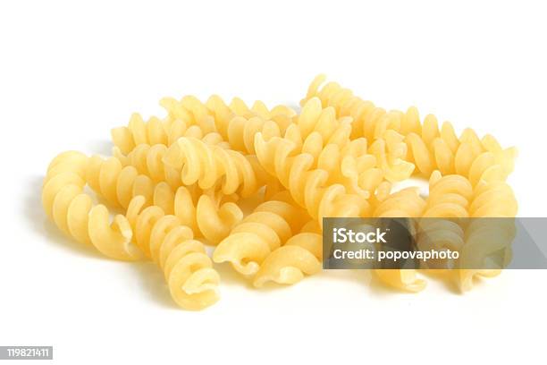 Closeup De Forma De Massa Italianaspiral - Fotografias de stock e mais imagens de Alimentação Saudável - Alimentação Saudável, Amarelo, Amontoar