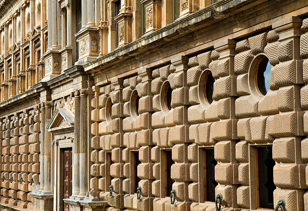 Muslim water fountain and decorated doors in the Alhambra of Granada in Spain