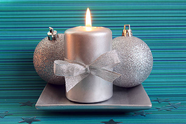 istock Christmas candle and two silver balls 119821705