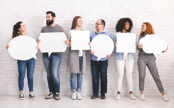 istock Group of diverse people with white speech bubbles 1198217903