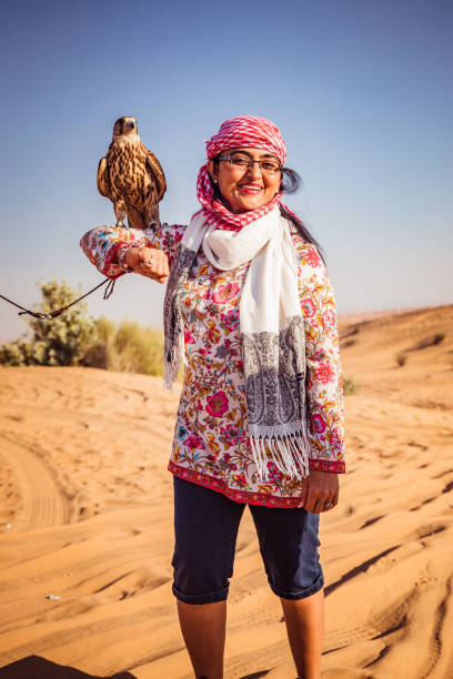 istock Indian Women with Falcon on Shoulder/hand 1198218044