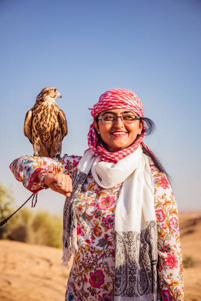 istock Indian Women with Falcon on Shoulder/hand 1198218063
