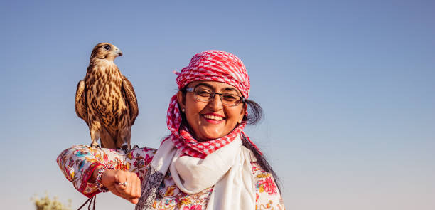 istock Indian Women with Falcon on Shoulder/hand 1198218064
