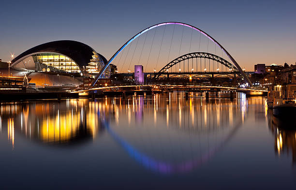 Gateshead Tyne and Millennium bridges at sundown  tyne bridge stock pictures, royalty-free photos & images