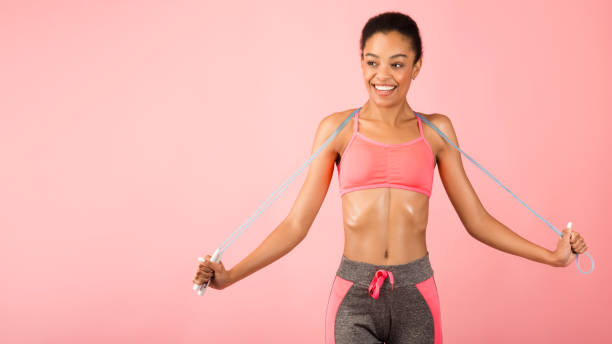 istock Cheerful Lady Holding Jump Rope Smiling Posing In Studio, Panorama 1198219770