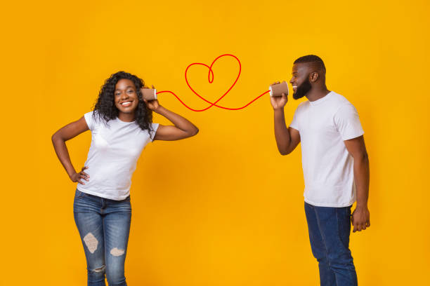 istock Afro guy singing love song to his girlfriend 1198219782