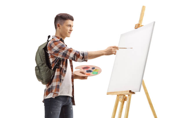istock Male student painting on a canvas 1198227015