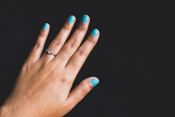 Indian woman hand wearing beautiful diamond ring