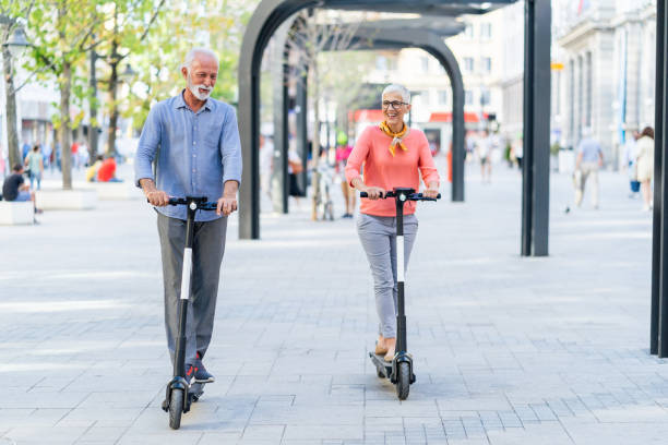 istock Modern senior couple with electric scooter 1198229292