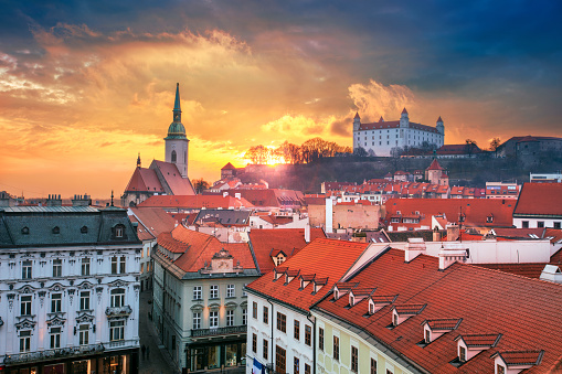 Aerial cityscape image of historical downtown of Bratislava, capital city of Slovakia during sunset.