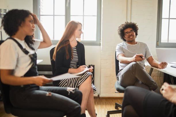 istock Creatives improvise a start up brainstorming meeting. 1198229551