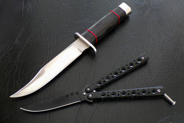 istock Knives close-up. Weapons for murderers and maniacs. 1198229857