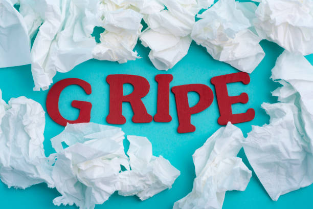 istock used tissues and word flu in spanish 1198230989