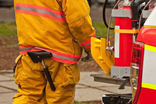istock Training firefighters. Demonstration rescue work. Firefighter near the fire truck. 1198231011