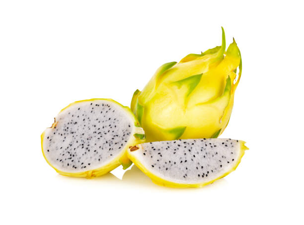 whole and half cut fresh dragon yellow shell fruit on white background whole and half cut fresh dragon yellow shell fruit on white background pitaya photos stock pictures, royalty-free photos & images
